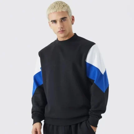 Model wearing a black, white, and blue color-block streetwear vest mockup, front view.